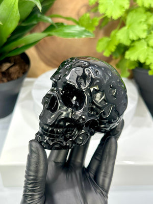 
                  
                    Load image into Gallery viewer, Black Obsidian Crystal Skull w/ Unique Etchings - Carved by Hand Perfect for Mineral Collectors, Metaphysical Use, and Home Decor - 20% OFF
                  
                